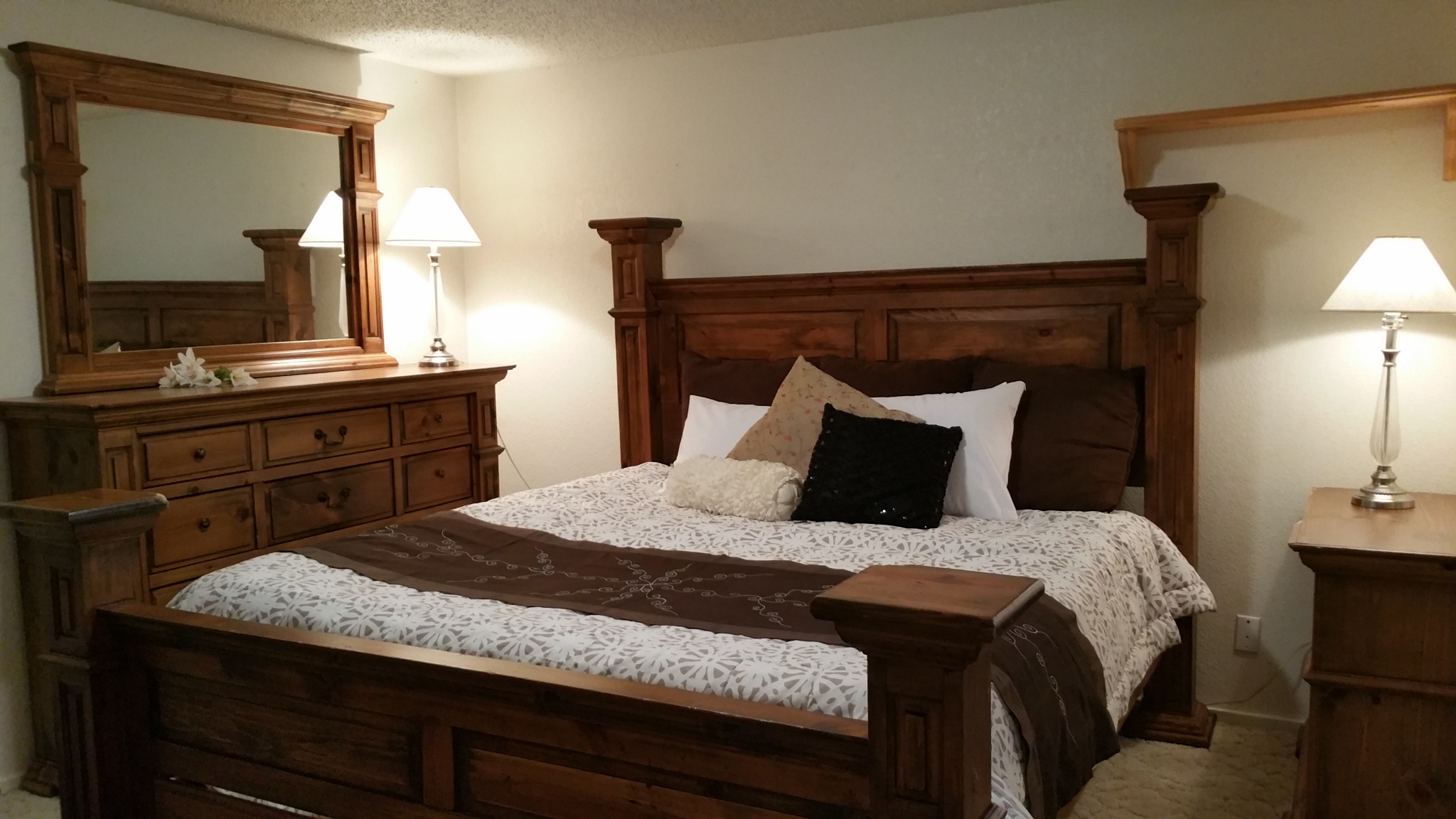Amazing King Sized bed with huge dresser and two nightstands!
